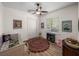 Charming bedroom with hardwood floors, decor, and lots of natural light at 130 Sylvana Ct, Auburndale, FL 33823
