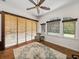 Bright bonus room with tiled floors, a ceiling fan, and windows providing pool views at 130 Sylvana Ct, Auburndale, FL 33823