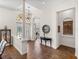 Spacious foyer boasts high ceilings, tile floors, and architectural details, creating a grand entrance at 130 Sylvana Ct, Auburndale, FL 33823