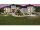 Beautiful single-story home with a well-manicured lawn and inviting landscaped entrance at 130 Sylvana Ct, Auburndale, FL 33823