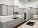 Bright kitchen with granite countertops, modern appliances, and sleek cabinets offering ample storage at 130 Sylvana Ct, Auburndale, FL 33823