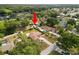 Property aerial view, highlighting the home's position within a neighborhood surrounded by mature trees at 137 Leitha Way, Lakeland, FL 33809