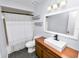 Bathroom featuring a modern vanity, a shower with curtain, and neutral wall color at 137 Leitha Way, Lakeland, FL 33809