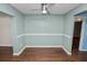 Open dining area featuring wood floors, neutral walls, and direct access to other rooms at 137 Leitha Way, Lakeland, FL 33809