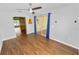 Dining room featuring wood-look floors and a sliding door to a porch area at 137 Leitha Way, Lakeland, FL 33809
