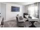 Comfortable home office with a sleek desk, plush seating, stylish decor, and plenty of natural light at 1429 Fleur Dr, Davenport, FL 33837