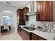 Gourmet kitchen with stainless steel appliances and granite counter tops at 1470 Silver Leaf Dr, Lakeland, FL 33813