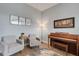 Comfortable sitting room with hardwood floors, neutral colors, and natural light at 1470 Silver Leaf Dr, Lakeland, FL 33813