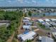 An aerial view of the property location in a community with a lake nearby at 1642 Tally Ho Dr, Lakeland, FL 33810