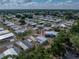 An aerial view of the property in a community with many homes at 1642 Tally Ho Dr, Lakeland, FL 33810