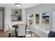 Breakfast area with built in cabinets, counters, coffee bar with view from the windows at 1642 Tally Ho Dr, Lakeland, FL 33810