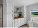Breakfast area with built in cabinets, counters, coffee bar and lots of natural light at 1642 Tally Ho Dr, Lakeland, FL 33810