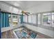 Bright sun room with an area rug and many windows at 1642 Tally Ho Dr, Lakeland, FL 33810