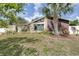 Charming home with landscaped front yard and architectural detailing at 1808 Stonecrest Ct, Lakeland, FL 33813