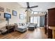 Spacious living room with vaulted ceilings, modern furnishings, and natural light at 1808 Stonecrest Ct, Lakeland, FL 33813