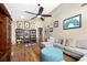 View of the living room with a high ceiling, and an entertainment center at 1808 Stonecrest Ct, Lakeland, FL 33813