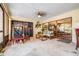 Enclosed patio with neutral walls, sliding glass doors, and ample room for seating at 1808 Stonecrest Ct, Lakeland, FL 33813