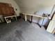Practical garage with workbench, cabinets, and storage solutions, perfect for hobbies and organization at 1809 Optimist Dr, Lakeland, FL 33801