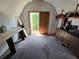 Spacious workshop with workbench, cabinets, and natural light, ideal for projects and hobbies at 1809 Optimist Dr, Lakeland, FL 33801