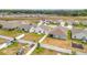 This spacious backyard is fully fenced, providing a safe area for outdoor activities with a storage shed at 1821 Thompson Preserve Boulevard, Bartow, FL 33830