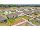 Aerial view of a fenced backyard showing ample space for outdoor activities and relaxation at 1821 Thompson Preserve Boulevard, Bartow, FL 33830
