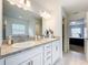 Dual sink bathroom vanity, walk-in shower with glass door at 1821 Thompson Preserve Boulevard, Bartow, FL 33830