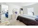 Bright bedroom with a neutral carpet and decor at 1821 Thompson Preserve Boulevard, Bartow, FL 33830