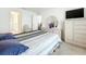 Neutral bedroom shows door to other parts of the home at 1821 Thompson Preserve Boulevard, Bartow, FL 33830