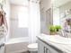 Fresh bathroom featuring a tub and shower combination, sleek fixtures, and stylish tile work at 1837 Noble Dr, Davenport, FL 33837