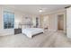 Spacious primary suite with walk-in closet, ensuite bathroom, and serene backyard views at 2070 W Lake Hamilton Dr, Winter Haven, FL 33881