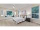 Comfortable bedroom featuring a window seat, neutral colors, and lots of light at 2070 W Lake Hamilton Dr, Winter Haven, FL 33881