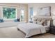 Relaxing bedroom featuring a large bay window with a window seat and neutral tones at 2070 W Lake Hamilton Dr, Winter Haven, FL 33881