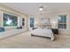 Spacious bedroom featuring a window seat, neutral colors, and lots of light at 2070 W Lake Hamilton Dr, Winter Haven, FL 33881