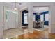 Grand foyer leading to an elegant dining room with a chandelier at 2070 W Lake Hamilton Dr, Winter Haven, FL 33881