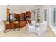 Kitchen with bar seating, dining area, and breakfast nook at 2070 W Lake Hamilton Dr, Winter Haven, FL 33881