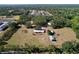 Sprawling acreage property features an open yard and a cluster of trees at 2171 Sophia S Pl, Lakeland, FL 33811