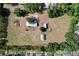 A lush landscape with trees bordering a spacious lot, offering privacy and serenity at 2171 Sophia S Pl, Lakeland, FL 33811