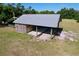 Open-sided barn with concrete flooring, perfect for storage and protection from the elements at 2171 Sophia S Pl, Lakeland, FL 33811