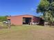 Exterior shot of a red barn featuring open sides and metal roof on sprawling acreage at 2171 Sophia S Pl, Lakeland, FL 33811