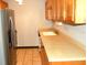 Modern kitchen featuring stainless steel appliances and tile flooring at 255 S Pennsylvania Ave, Lake Alfred, FL 33850