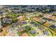 Aerial photo highlighting the property's placement within a tranquil, tree-lined neighborhood at 2551 Delphi Woods Cir, Lakeland, FL 33812