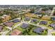 Expansive aerial shot showcasing the home's location within a serene and well-planned community at 2551 Delphi Woods Cir, Lakeland, FL 33812