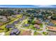 Wide aerial view of the community emphasizing the property's attractive landscaping and street appeal at 2551 Delphi Woods Cir, Lakeland, FL 33812