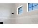 Bathroom featuring two windows and black hardware at 2551 Delphi Woods Cir, Lakeland, FL 33812