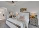 Cozy bedroom with neutral tones, a plush bed, and soft lighting for relaxation at 2551 Delphi Woods Cir, Lakeland, FL 33812