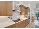Gourmet kitchen with stainless steel appliances, stylish backsplash, and ample counter space at 2551 Delphi Woods Cir, Lakeland, FL 33812