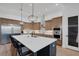 Modern kitchen with a large island and ample counter space at 2551 Delphi Woods Cir, Lakeland, FL 33812