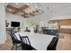 Open-concept layout with dining area, living room, and modern kitchen at 2551 Delphi Woods Cir, Lakeland, FL 33812