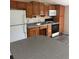 A kitchen featuring ample cabinet storage, and white appliances at 2621 Island Oaks W, Lakeland, FL 33805