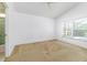 Bright bedroom with ceiling fan and large window offering natural light and views of the pool at 2660 Hemingway Ave, Haines City, FL 33844
